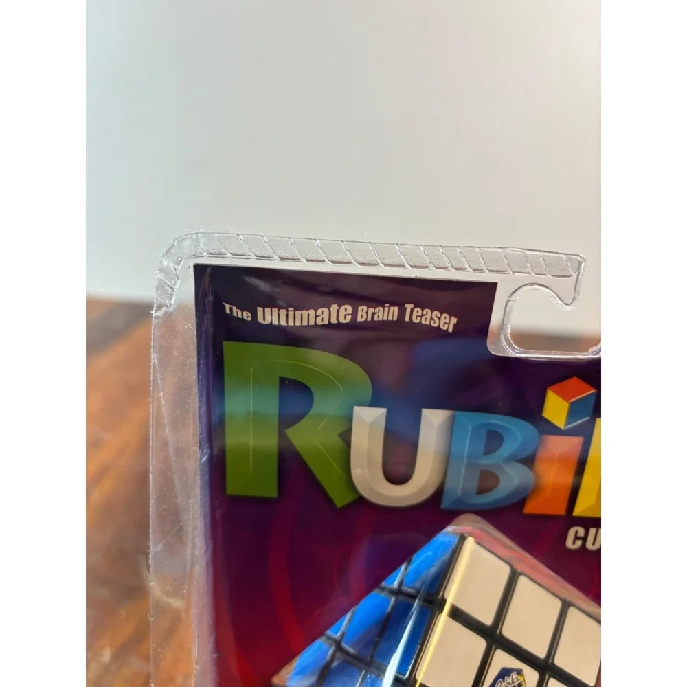 Milton Bradley Rubiks Cube 3x3 Puzzle with Stand and Booklet 54033 New Sealed